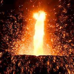 Molten iron pouring into crucible