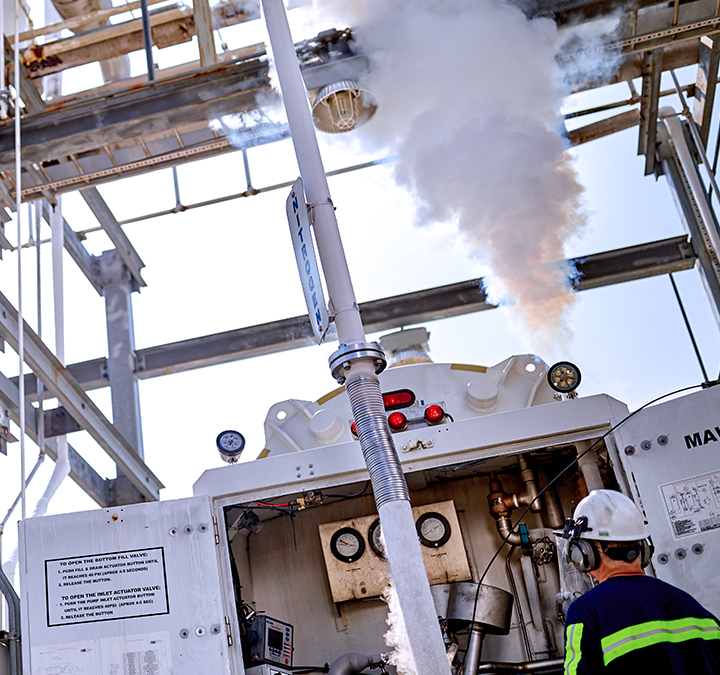 Messer Engineer Inspecting Machinery